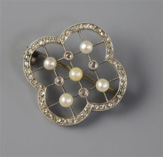 An Edwardian white gold diamond and pearl trellis pattern brooch, 26mm.